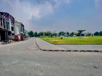 Facing Park 5 Marla Residential Plot For Sale In Lake City Lahore.