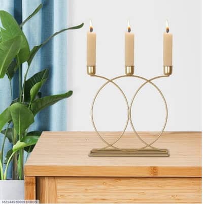 Golden candle stand with calligraphy for home and events