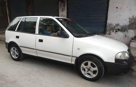 Suzuki Cultus VXL 2004 Model White Colour bumper to bumper Genuine