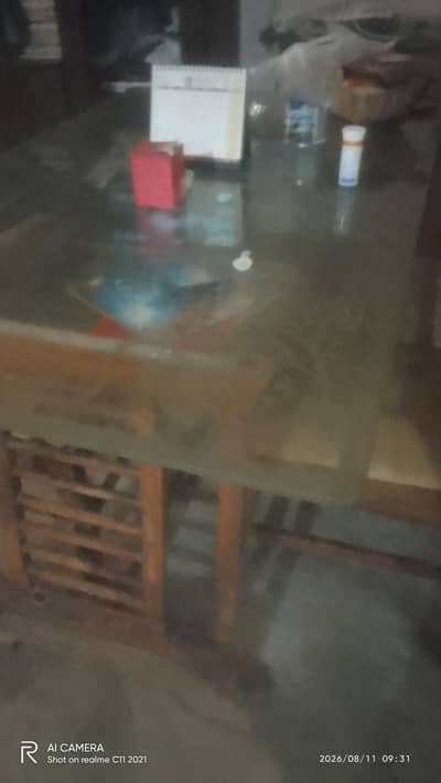 Dining table with four chairs available for sale