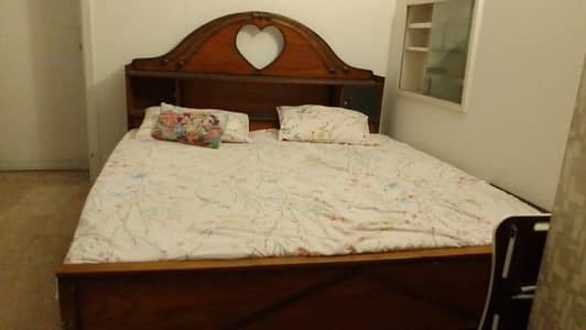 Wooden king size bed