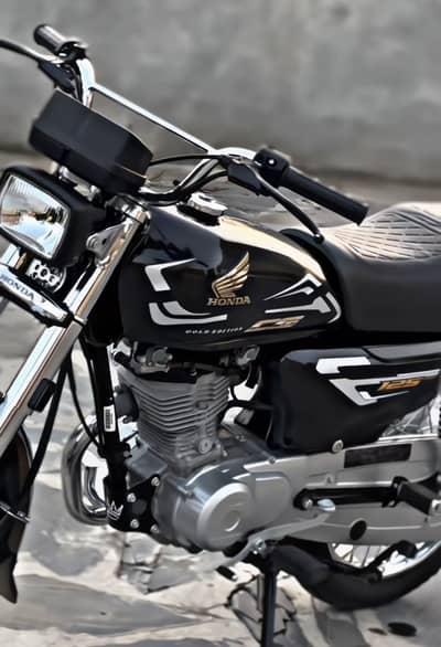 Honda 125 Rapping 2 side different