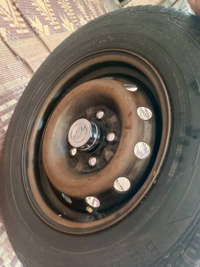 1x 205/70 R15 C BG Alro plus tyre with rim Fateh Jung attock
