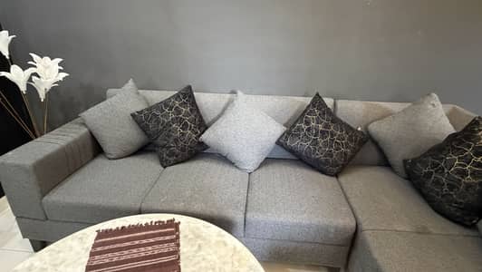 Gray sofa with kussion