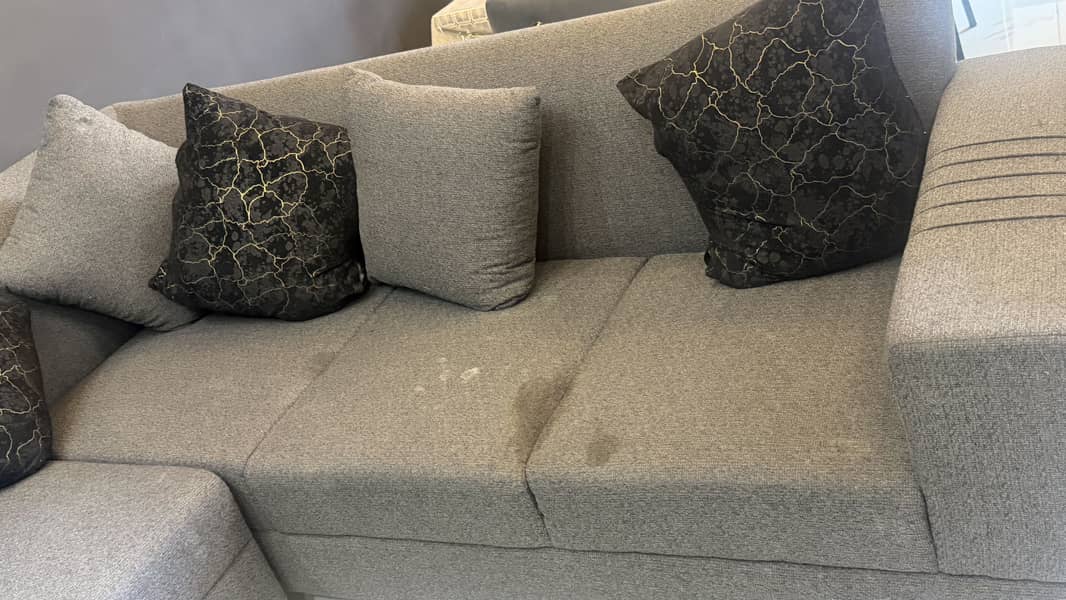 Gray sofa with kussion 1