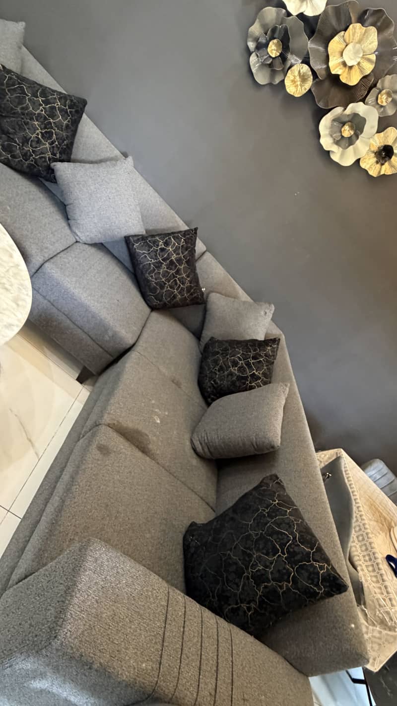 Gray sofa with kussion 2
