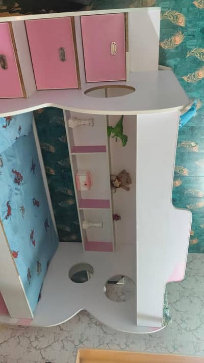slightly used bed with 3 person sleeping area