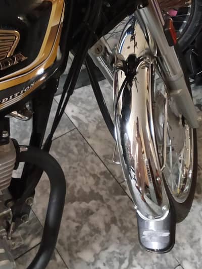 125 gold self start