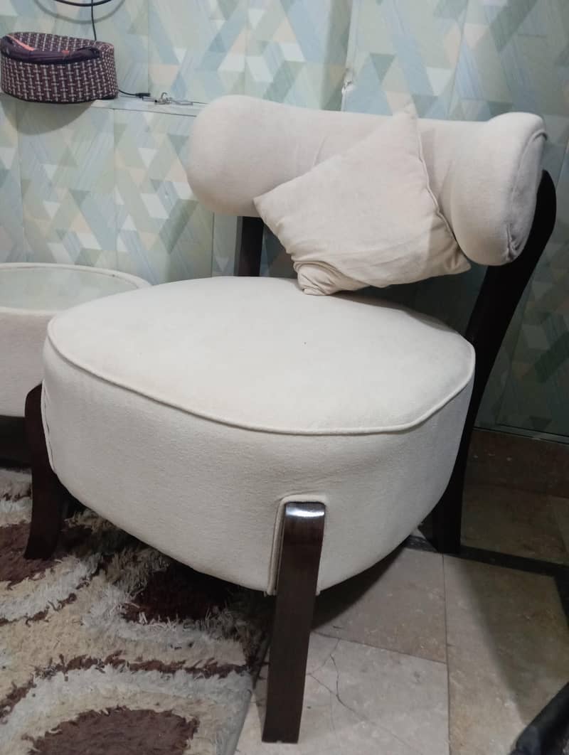 2sofa chairs with small table 2
