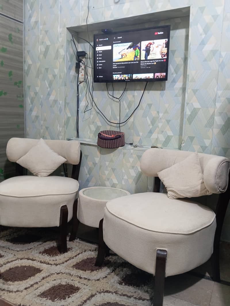 2sofa chairs with small table 4