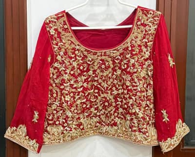 Bridal Lehnga Choli and Dupatta with matching potli and jewellery set