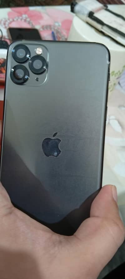 Apple iPhone 11 Pro Max with charger and cable