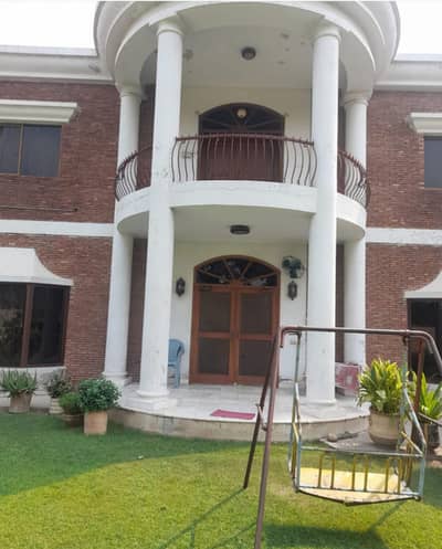 2 Kanal Used Modern Design Most Beautiful 4-Bedroom Facing Park Bungalow For Sale At Prime Location Of DHA Lahore Near To Park Masjid & Commercial Market.