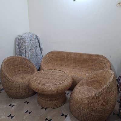 Cane sofa set with round table
