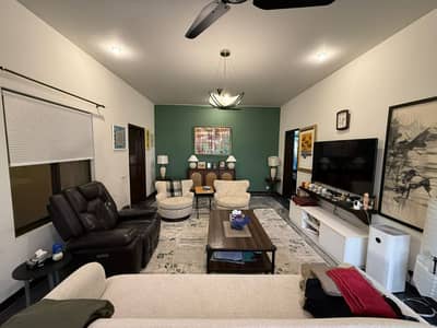 One Kanal Used Modern Design Well Maintained Bungalow For Sale At Prime Location Of DHA Lahore Near To Park Masjid & Commercial Market.