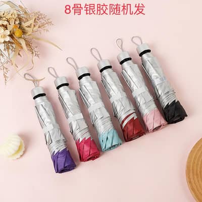 silver plastic sun umbrella's set of 7 collors