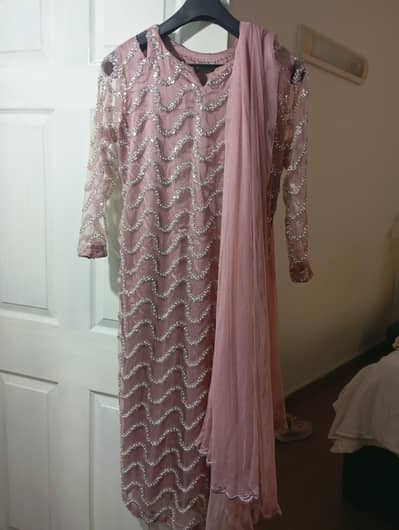 Pink and silver colour net shirt with lehnga