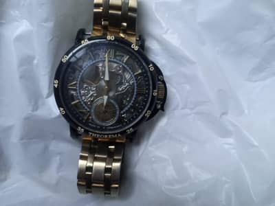 Antique wrist watch and wall clock