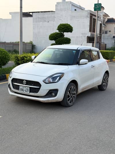 Suzuki swift GLX top of varient