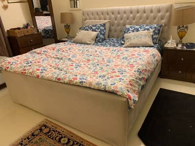 Wooden bed with new tufting