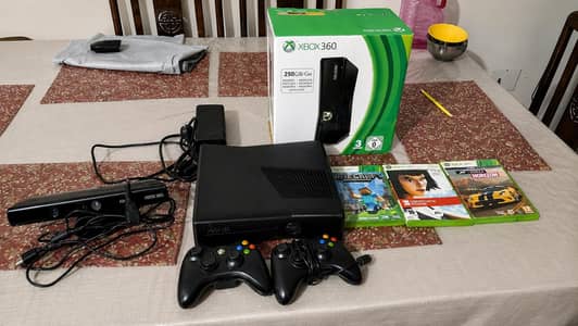 xbox 360 slim with 2 controllers and kinect