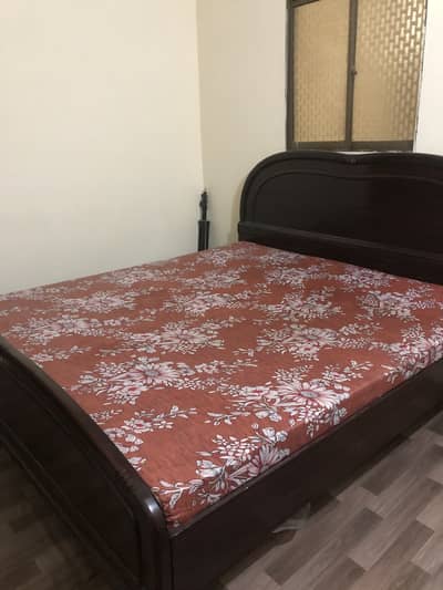 Wooden king size bed