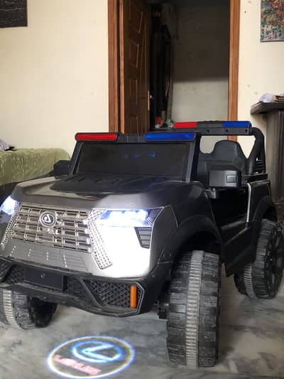 Kid's battery operated and remote control jeep.