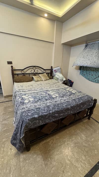 Wooden plus iron double Bed with mattress