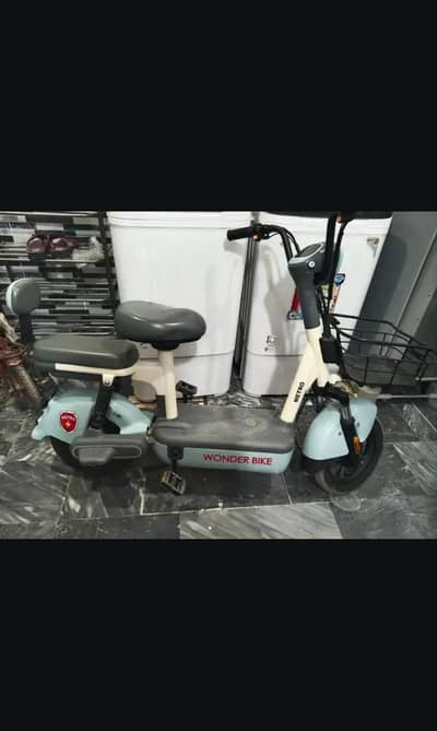 electric scooty like new condition