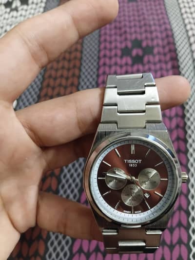 Tissot-style chronograph watch. Original Tissot nahi.