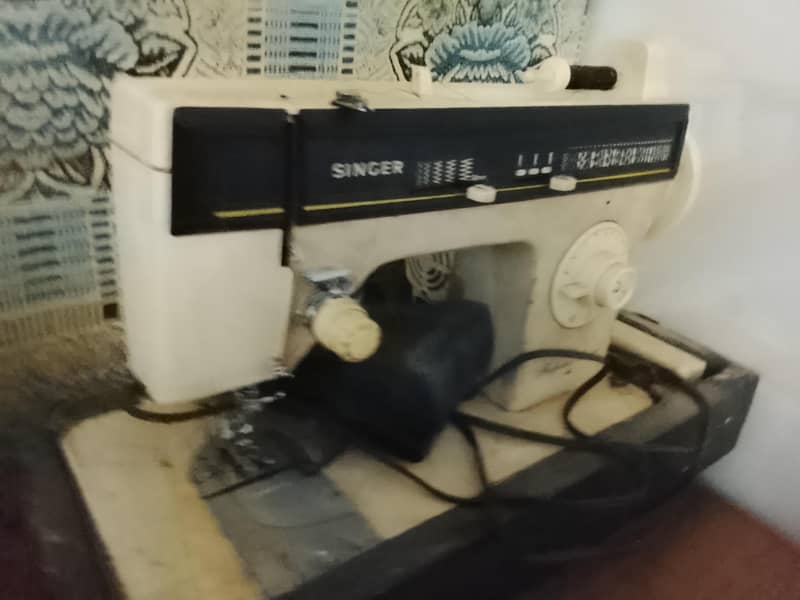 singer machine 1