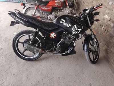 yamaha ybr 125 blue colour black rapped with one digit golden number