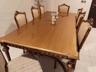 Dinning table with 8 chairs and 1 sideboard plus 1 mirror