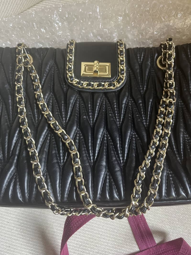 Black handbag 1