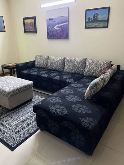 7 Seater L-Shape Sofa 9/10 condition with cushions