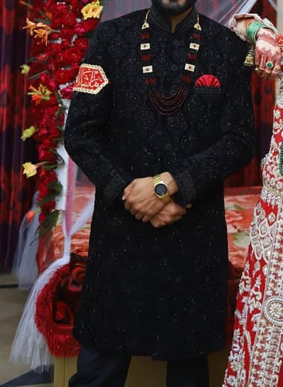 Black sherwani and red maronish qula and mala for sale