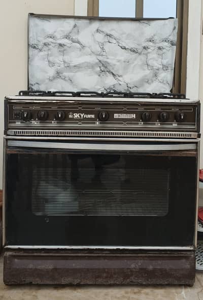Sky flame cooking range and oven