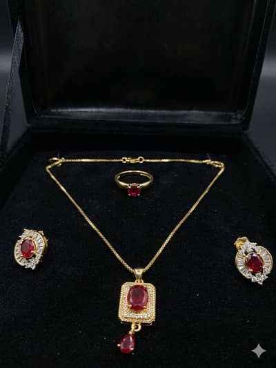 Elegant Gold Plated Ruby Jewelry Set (Pendant, Earrings & Ring)