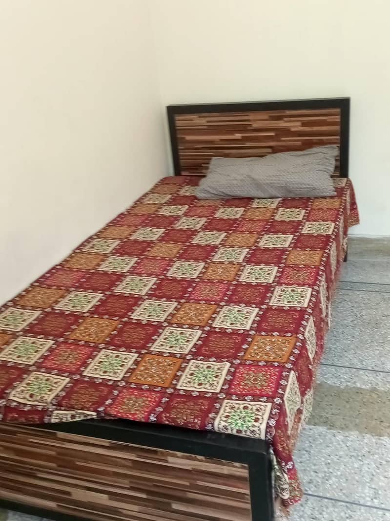 iron framed bed 0