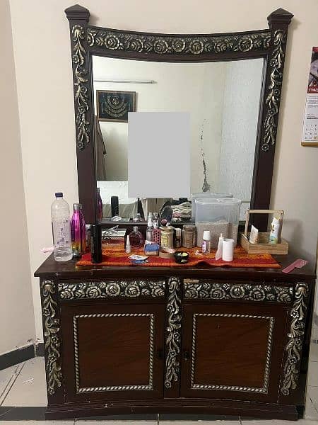 A bed and dressing table 1