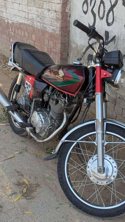 Honda 125 model 14 red color