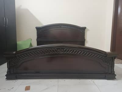 bed with 4 door wardrobes