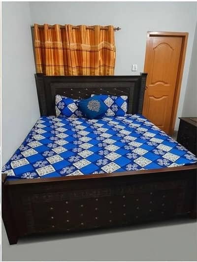 bed, side tables, dressing table