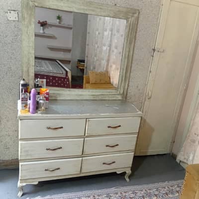 solid wooden bed with dresser