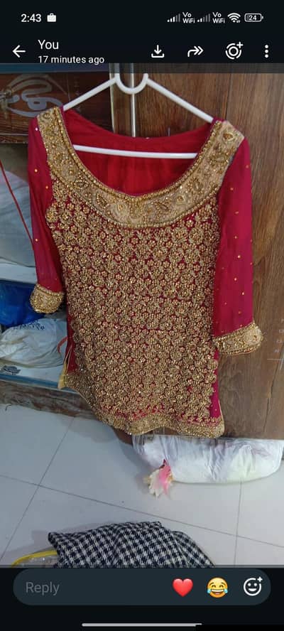 a rose red lehnga in neat work. . . wore just once