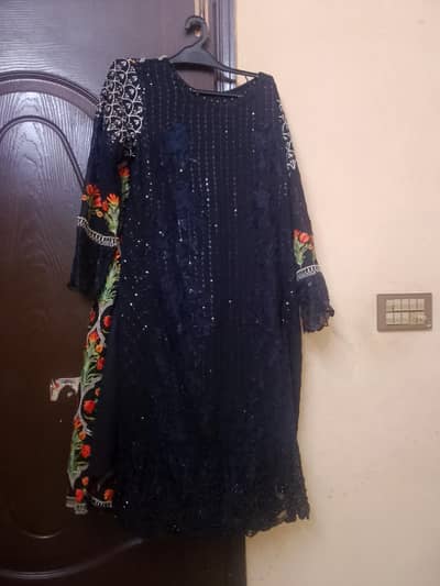 black sequence with embroid suit