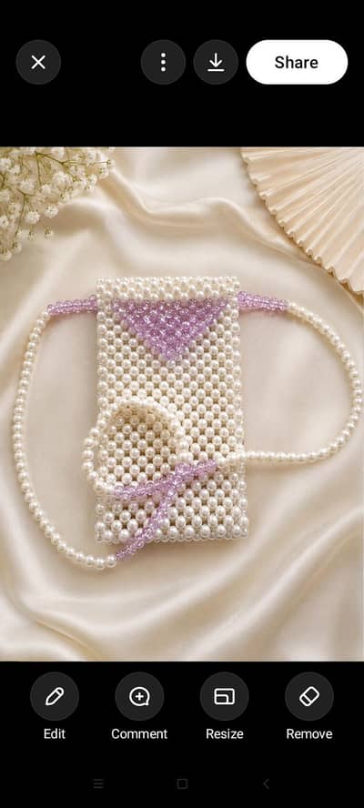 handmade pearl mobile pouch