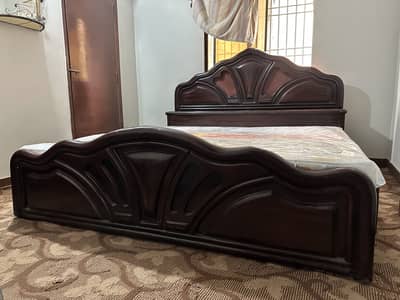 Wooden double bed