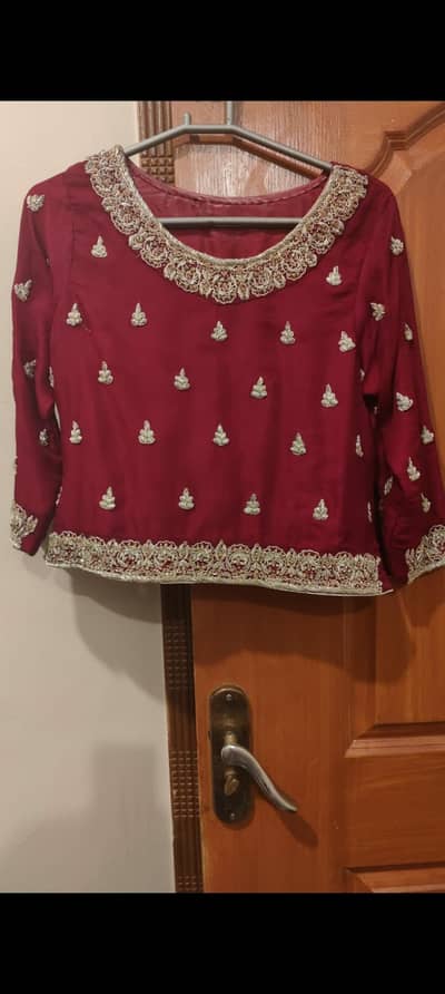 bridal lehenga choli in red with dabka work
