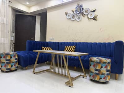 L shapes sofas and table for sale